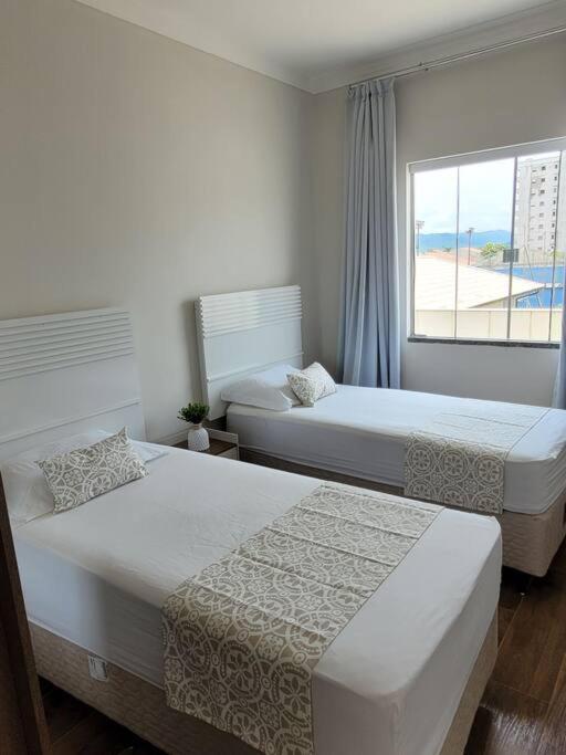 Holiday home Sobrado Com Garagem E Churrasqueira